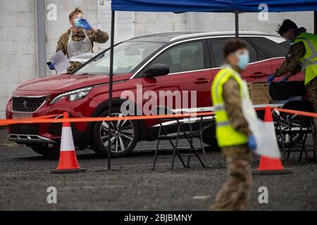 NOTE: NUMBER PLATE PIXELATED BY THE PA PICTURE DESK Members of the military man a Covid-19 testing centre in Hereford, as the UK continues in lockdown to help curb the spread of the coronavirus. Stock Photo
