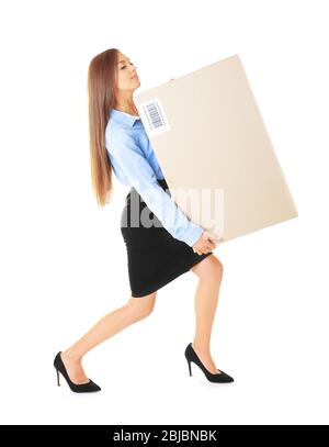 Beautiful businesswoman carrying heavy box on white background Stock Photo