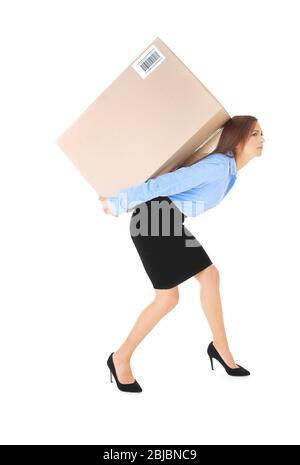 Beautiful businesswoman carrying heavy box on white background Stock Photo