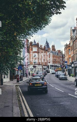 London/UK-30/7/18: traffic on Fitzjohn's Avenue in Hampstead, which has some of the most expensive housing in the London area and more millionaires wi Stock Photo