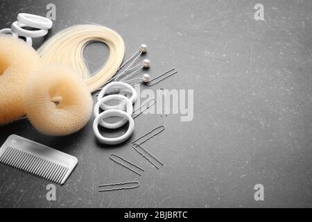 Accessory for hairstyle on grey background Stock Photo