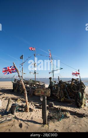 Town of Wallasey, England. Picturesque view of the Black Pearl pirate ship on the shores of New Brighton beach. Stock Photo