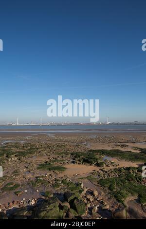 Town of Wallasey, England. Picturesque view of New Brighton beach, with the River Mersey and the city of Liverpool docks in the Background. Stock Photo