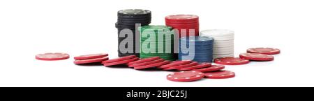 Piles of casino betting chips on white background Stock Photo