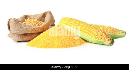 Bag with corn seeds, cornmeal and corncobs isolated on white Stock Photo