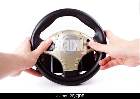 Racing steering arcade wheel controller, both hands holding car wheel game controller with lots of buttons isolated on white, first person view Stock Photo