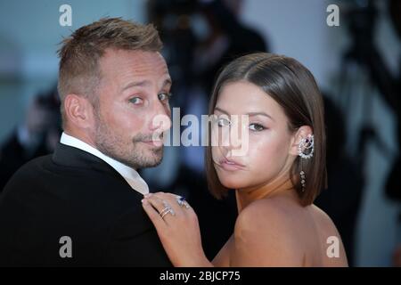 VENICE, ITALY - SEPTEMBER 08: Adele Exarchopoulos and Matthias Schoenaerts walk the red carpet of the 'Racer And The Jailbird' Stock Photo