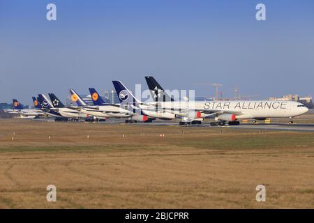 Frankfurt, Germany – April 7, 2020: Lufthansa airplanes during Coronavirus Corona Virus COVID-19 at Frankfurt  Airport in Germany