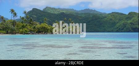 Tropical island and lagoon in French Polynesia, Huahine, Pacific ocean, Oceania Stock Photo