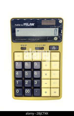 Old electronic calculator close up isolated on white background Stock Photo
