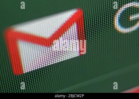 Google gmail envelope icon on screen, close-up Stock Photo