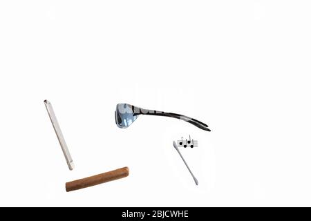 Mobile phone, sun glasses, cigar, earbud + music notes. Concept: invisible man, Modern man, fashion,  streaming, earphones, man of the world, Stock Photo