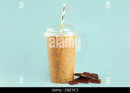 Chocolate milkshake in a plastic cup Stock Photo - Alamy