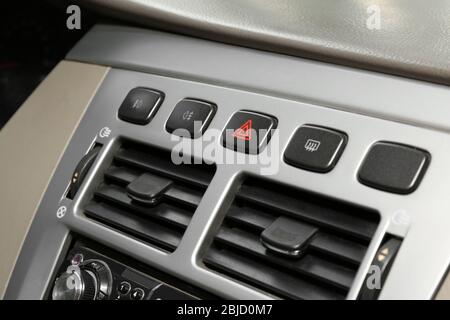 Emergency warning button on car console, closeup Stock Photo