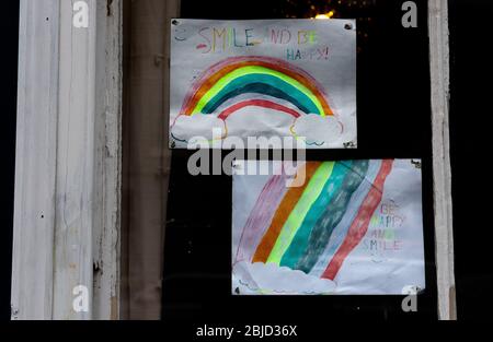 Thaxted, UK. 29th Apr, 2020. Coronovirus Lock Down. Thaxted Essex England. Rainbow salutes to NHS and all essential workers. 29 April 2020 Childrens drawings of a rainbow decorate many windows in Thaxted Essex UK as a show of support for the NHS (National Health Service) and all essential workers during the Coronavirus pandemic lock dow. Photograph by Credit: BRIAN HARRIS/Alamy Live News Stock Photo