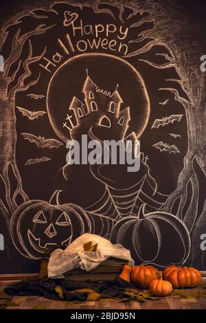 Happy Halloween words written on   blackboard Stock Photo