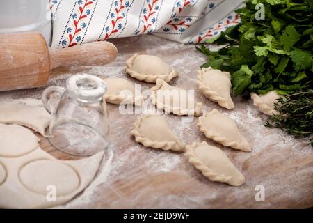 handmade dumplings on the wooden background Stock Photo