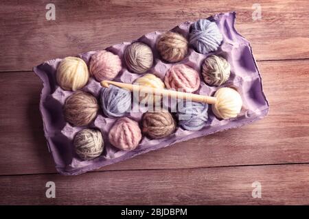 Balls of knitting yarn in package Stock Photo