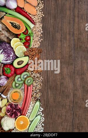 Super food for a healthy life concept with health foods high in antioxidants, anthocyanins, vitamins, minerals, protein, omega 3 and fibre. Stock Photo