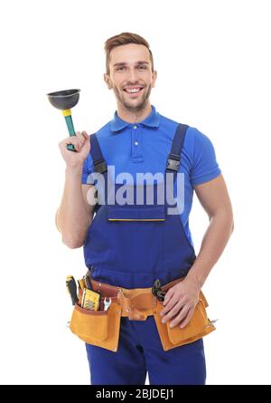 Plumber in blue uniform holding plunger on white background Stock Photo