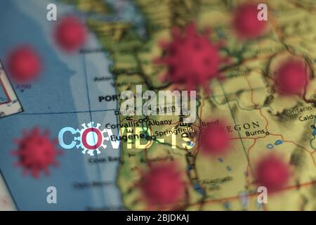 Covid-19 outbreak or new Coronavirus, 2019-nCoV, virus  on a map of USA . Covid 19-NCP virus: contagion and propagation of disease in Portland, Salem Stock Photo