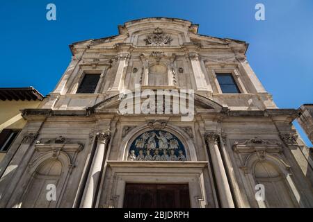 Facade of the Chiesa di Ognissanti (All-Saints Church) is a Franciscan church in Florence, Tuscany, Italy. Example of baroque architecture. Stock Photo