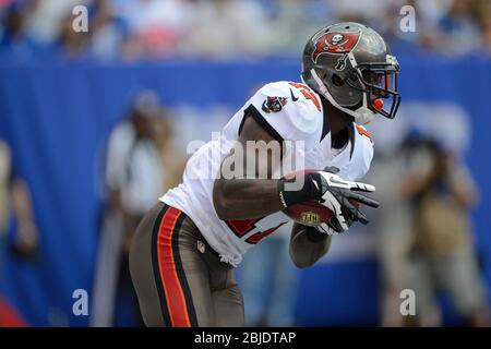 16 September 2012: Tampa Bay Buccaneers wide receiver Arrelious Benn (17) runs back a kick off during a week 2 NFL NFC matchup between the Tampa Bay B Stock Photo