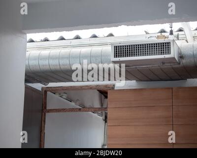 Air cleaner connected exhaust pipe in restaurant. Stock Photo