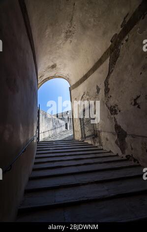 Stone corridor with stairway in Palazzo Pitti, Florence, Tuscany, Italy Stock Photo