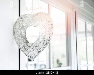 Pink Heart Window Heart Shaped Decoration Hanging near Window with Festive Lights Stock ...