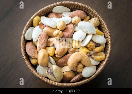 Roasted and salty, mixed nuts and kernels snack Stock Photo