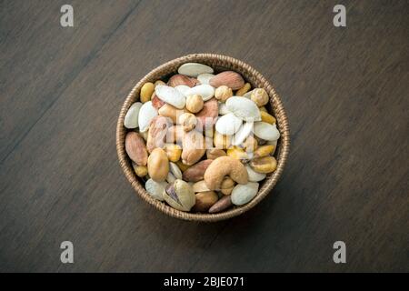 Roasted and salty, mixed nuts and kernels snack Stock Photo