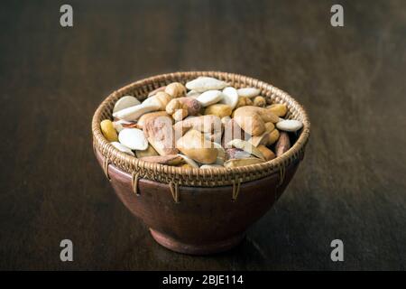 Roasted and salty, mixed nuts and kernels snack Stock Photo