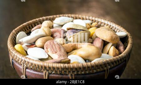 Roasted and salty, mixed nuts and kernels snack Stock Photo
