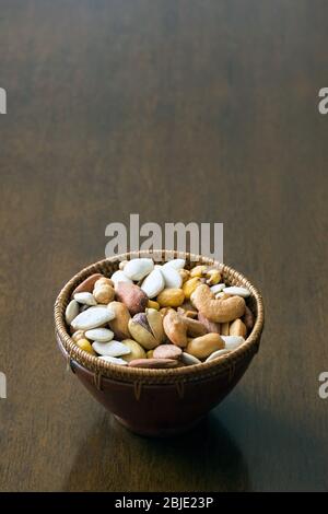 Roasted and salty, mixed nuts and kernels snack Stock Photo