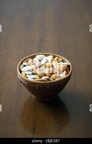 Roasted and salty, mixed nuts and kernels snack Stock Photo