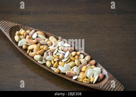 Roasted and salty, mixed nuts and kernels snack Stock Photo