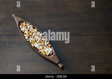 Roasted and salty, mixed nuts and kernels snack Stock Photo