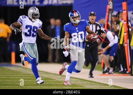 Dallas Cowboys wide receiver Brandon Smith (80) catches a pass in front of Seattle  Seahawks cornerback John Reid (29) in the second half of a preseason NFL  football game in Arlington, Texas, Friday, Aug. 26, 2022. (AP Photo/Michael  Ainsworth Stock