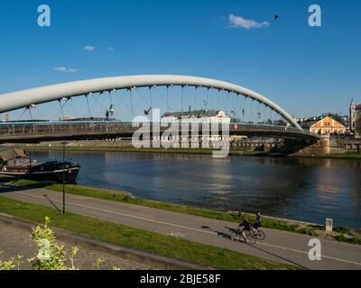 Cracow/Poland - 27/04/2020. Vie over vistula river, boulevards and Bernatka footbridge. Stock Photo