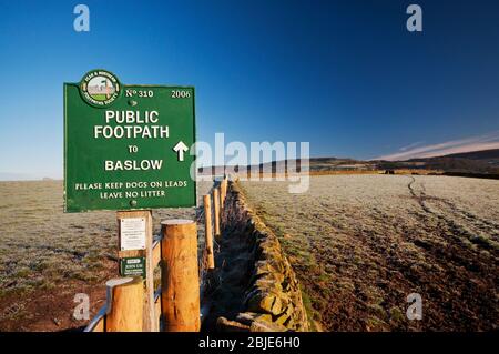 Public footpath sign en route to Baslow in the Peak District National Park Stock Photo