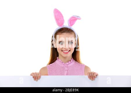 Beautiful girl with bunny ears and blank banner on white background Stock Photo