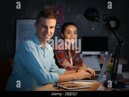 Two young designers at workplace Stock Photo