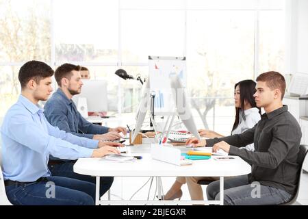 Young programmers working in office Stock Photo