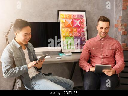 Young programmers resting in office Stock Photo