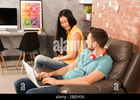 Young programmers resting in office Stock Photo