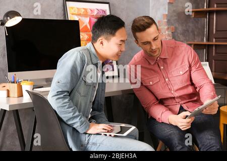 Young programmers resting in office Stock Photo