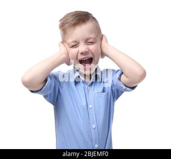 Cute little boy covering ears with hands, on white background Stock Photo