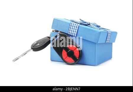 Car keys and gift box on white background Stock Photo