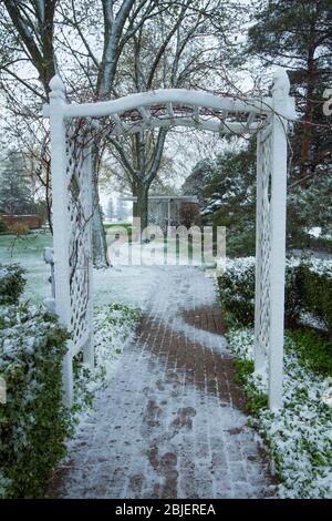 Snowy wedding day chapel,gazebo and cottage Stock Photo